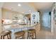 Updated kitchen features white cabinetry, granite countertops, and stainless steel appliances at 4555 S Atlantic Ave # 4304, Ponce Inlet, FL 32127