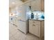 White kitchen with stainless steel appliances at 4555 S Atlantic Ave # 4304, Ponce Inlet, FL 32127