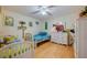 Bedroom with twin beds, dresser, and ceiling fan at 4555 S Atlantic Ave # 4304, Ponce Inlet, FL 32127