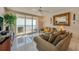 Relaxing living room with ocean views, comfortable seating, and a ceiling fan at 4555 S Atlantic Ave # 4304, Ponce Inlet, FL 32127