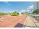 Gated community entrance with brick pavers and lush landscaping at 231 Riverside Dr # 2601-1, Daytona Beach, FL 32117
