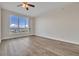Bright bedroom with hardwood floors and city views at 231 Riverside Dr # 2601-1, Daytona Beach, FL 32117