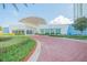 Modern community building with covered entrance and landscaping at 231 Riverside Dr # 2601-1, Daytona Beach, FL 32117