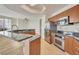 Open kitchen with granite countertops and stainless steel appliances at 231 Riverside Dr # 2601-1, Daytona Beach, FL 32117