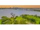 Aerial view of waterfront property with pier and bridge at 231 Riverside Dr # 2601-1, Daytona Beach, FL 32117