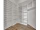 Large storage room with built in shelving at 231 Riverside Dr # 2601-1, Daytona Beach, FL 32117