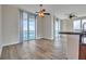 Bright dining room featuring hardwood floors and balcony access at 231 Riverside Dr # 2601-1, Daytona Beach, FL 32117
