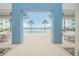 Inviting community pool with palm trees and seating areas at 231 Riverside Dr # 2601-1, Daytona Beach, FL 32117