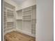 Spacious walk-in closet with ample shelving and hanging space at 231 Riverside Dr # 2601-1, Daytona Beach, FL 32117