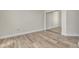 Bright bedroom with mirrored closet and wood-look flooring at 231 Riverside Dr # 2601-1, Daytona Beach, FL 32117