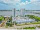 Aerial view of twin towers, parking, and waterfront at 231 Riverside Dr # 2601-1, Daytona Beach, FL 32117