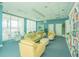 Relaxing community room with comfortable seating and a library at 231 Riverside Dr # 2601-1, Daytona Beach, FL 32117