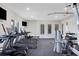 Modern gym with a variety of exercise equipment for residents at 1661 Lake Reserve Dr, Deland, FL 32724