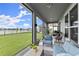 Relaxing screened patio with lake view at 137 Azure Mist Way, Daytona Beach, FL 32124