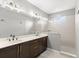 Double vanity bathroom with modern finishes and a large walk-in shower at 137 Azure Mist Way, Daytona Beach, FL 32124