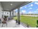 Screened patio overlooking a lake at 137 Azure Mist Way, Daytona Beach, FL 32124