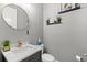 Modern bathroom with floating vanity and decor at 137 Azure Mist Way, Daytona Beach, FL 32124
