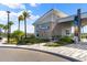 Community clubhouse featuring modern design and landscaping at 137 Azure Mist Way, Daytona Beach, FL 32124