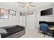 Bedroom with a daybed, workspace, and closet at 137 Azure Mist Way, Daytona Beach, FL 32124