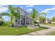 Two-story house with front porch and landscaping at 137 Azure Mist Way, Daytona Beach, FL 32124