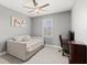 Bedroom with daybed, desk, and window at 137 Azure Mist Way, Daytona Beach, FL 32124