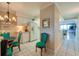 Bright kitchen with breakfast nook and white cabinets at 4565 S Atlantic Ave # 5308, Port Orange, FL 32127