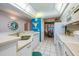 Clean and bright kitchen with white cabinets and granite countertops at 4565 S Atlantic Ave # 5308, Port Orange, FL 32127