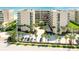 Oceanfront condo building with parking and tropical landscaping at 4565 S Atlantic Ave # 5308, Port Orange, FL 32127