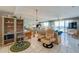 Bright living room with ocean view, comfortable seating, and tiled floors at 4565 S Atlantic Ave # 5308, Port Orange, FL 32127