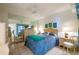 Comfortable bedroom with a queen-size bed and mirrored closet at 4565 S Atlantic Ave # 5308, Port Orange, FL 32127