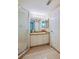 Clean bathroom with granite vanity and a walk-in shower at 4565 S Atlantic Ave # 5308, Port Orange, FL 32127