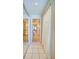 View down long bathroom hallway leading to the Primary bath at 4565 S Atlantic Ave # 5308, Port Orange, FL 32127