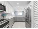 Modern kitchen featuring stainless steel appliances and ample counter space at 89 S Atlantic Ave # 1002, Ormond Beach, FL 32176
