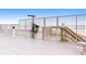 Beach access with boardwalk, gate, and outdoor shower at 89 S Atlantic Ave # 1002, Ormond Beach, FL 32176