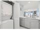 Stackable washer and dryer in a convenient laundry closet at 89 S Atlantic Ave # 1002, Ormond Beach, FL 32176