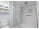 Walk-in shower with marble tile and modern fixtures at 89 S Atlantic Ave # 1002, Ormond Beach, FL 32176
