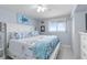 Main bedroom with ocean view and comfortable king-size bed at 89 S Atlantic Ave # 1002, Ormond Beach, FL 32176
