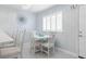 Bright dining area with seating for four, perfect for casual meals at 89 S Atlantic Ave # 1002, Ormond Beach, FL 32176