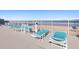 Beachfront deck with lounge chairs and ocean views at 89 S Atlantic Ave # 1002, Ormond Beach, FL 32176
