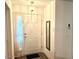 Bright entryway with mirror and coat closet at 129 Blue Heron Dr # A, Daytona Beach, FL 32119