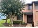 Two-story townhome with mature landscaping at 129 Blue Heron Dr # A, Daytona Beach, FL 32119