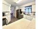 Bright kitchen with ample counter space and stainless steel appliances at 129 Blue Heron Dr # A, Daytona Beach, FL 32119