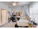 Bedroom with bed, desk and whimsical decor at 424 Luna Bella Ln # 222, New Smyrna Beach, FL 32168