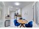 Bright kitchen features a breakfast nook and marble-look flooring at 424 Luna Bella Ln # 222, New Smyrna Beach, FL 32168