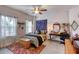 Bedroom with queen bed, dresser, and rug at 424 Luna Bella Ln # 222, New Smyrna Beach, FL 32168