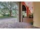 Community patio area with string lights and potted plants at 424 Luna Bella Ln # 222, New Smyrna Beach, FL 32168
