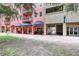 Building exterior showcasing retail spaces and landscaping at 424 Luna Bella Ln # 222, New Smyrna Beach, FL 32168