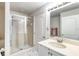 Clean bathroom with shower and vanity at 424 Luna Bella Ln # 222, New Smyrna Beach, FL 32168