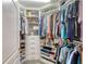Large walk-in closet with ample shelving and hanging space at 424 Luna Bella Ln # 222, New Smyrna Beach, FL 32168