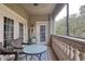 Private balcony with table and chairs, offering scenic views at 424 Luna Bella Ln # 222, New Smyrna Beach, FL 32168